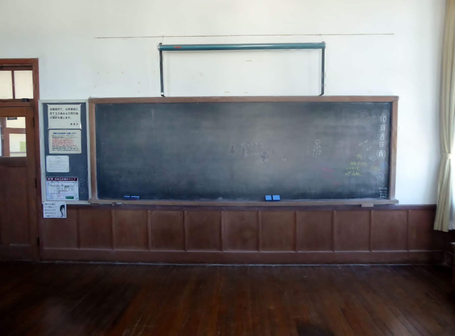 An empty blackboard in an old Japanese school building